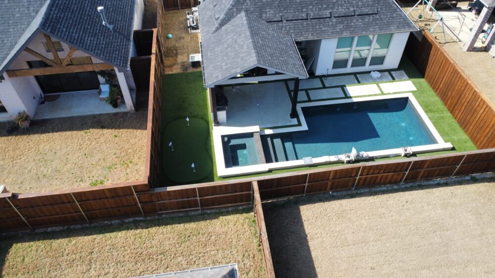pool backyard with turf